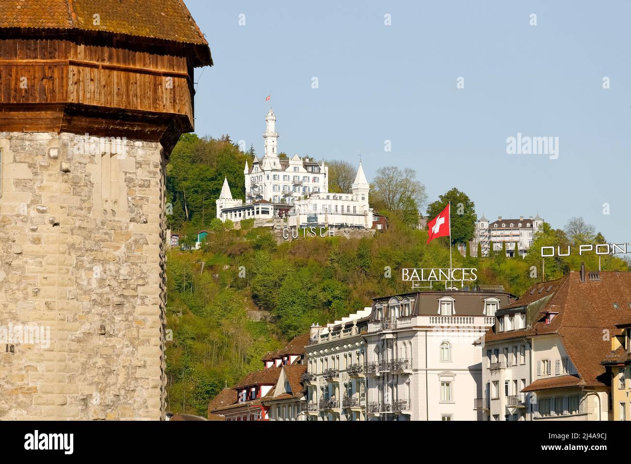 Lucerne, Switzerland - May 05, 2016: White building of the Gutsch castle with its hotel and restaurant is located on a hill over the city. Stock Photo