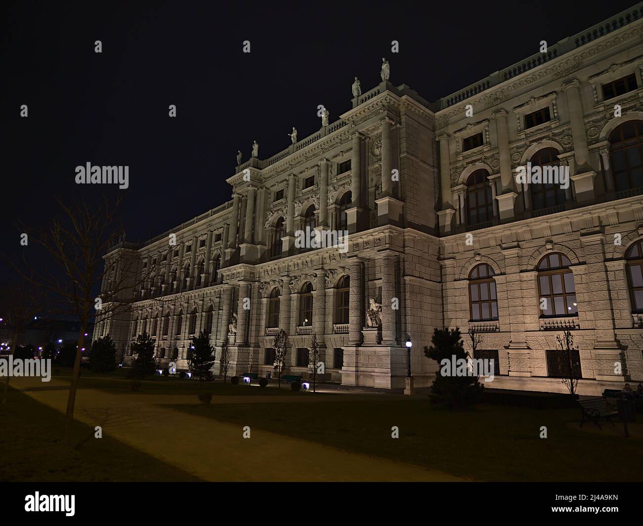 Beautiful view of the rear of famous Natural History Museum (NHM) of Vienna, Austria at night in the historic downtown with illuminated facade. Stock Photo