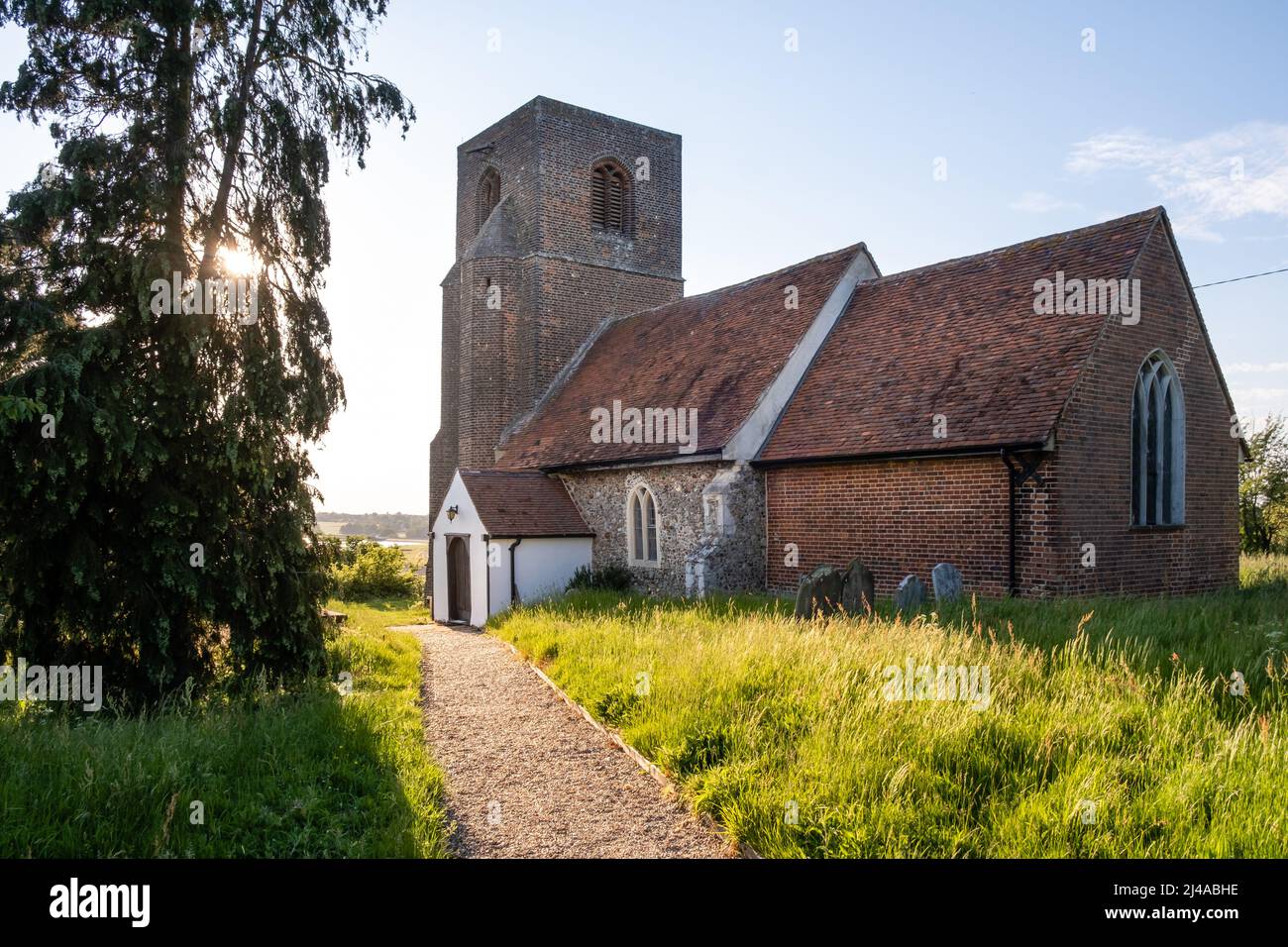 St. Andrew's Anglican Church and churchyard in the Essex village of Abberton. Stock Photo
