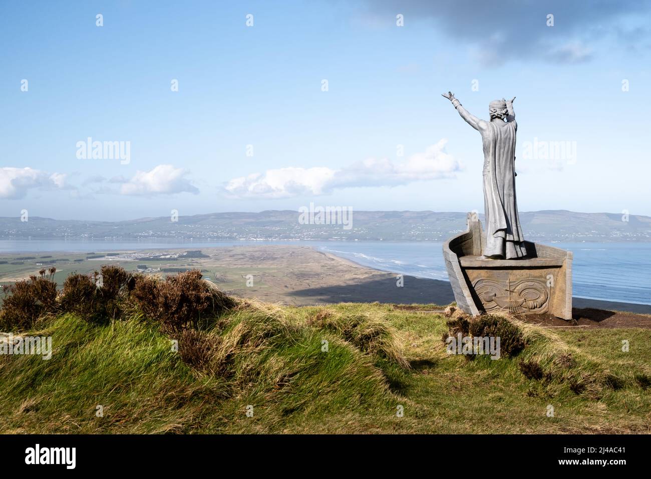 Manannán Mac Lir sea god sculpture above Gortmore Viewpoint in the Binevenagh Mountain. With a view towards Magilligan Point. Stock Photo