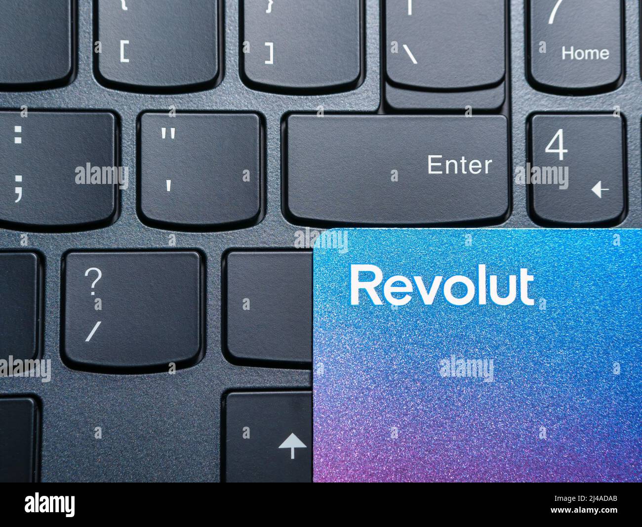 Bucharest, Romania - 03.25.2022: Revolut bank credit or debit card on a computer keyboard. Online electronic commerce concept Stock Photo