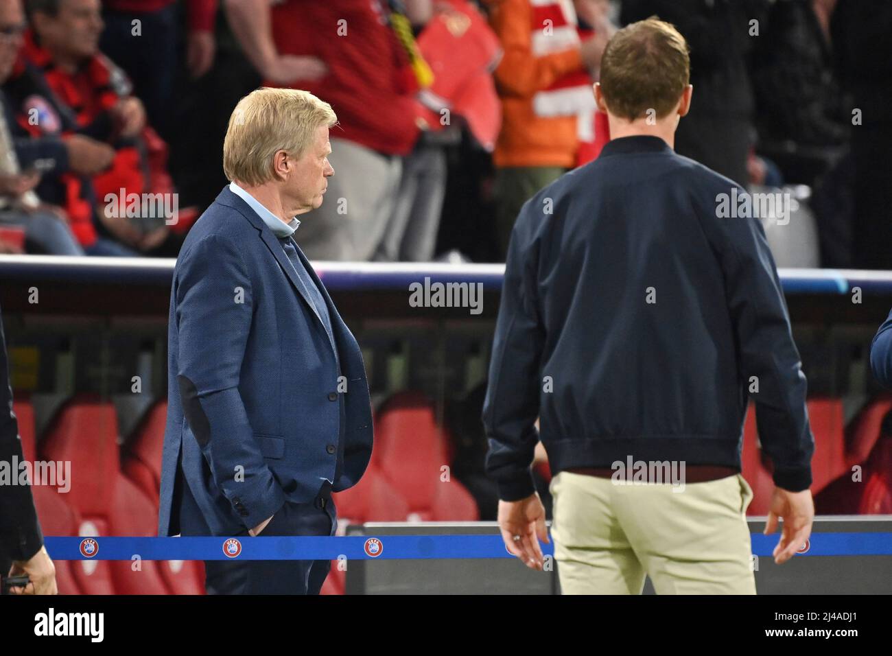 Oliver KAHN (Management Chairman FCB), looks to the side as coach Julian NAGELSMANN (FC Bayern Munich) walks past him, ignores him. Soccer Champions League/ quarter-finals FC Bayern Munich - Villarreal CF 1-1, on April 12th, 2022 ALLIANZARENA . Stock Photo