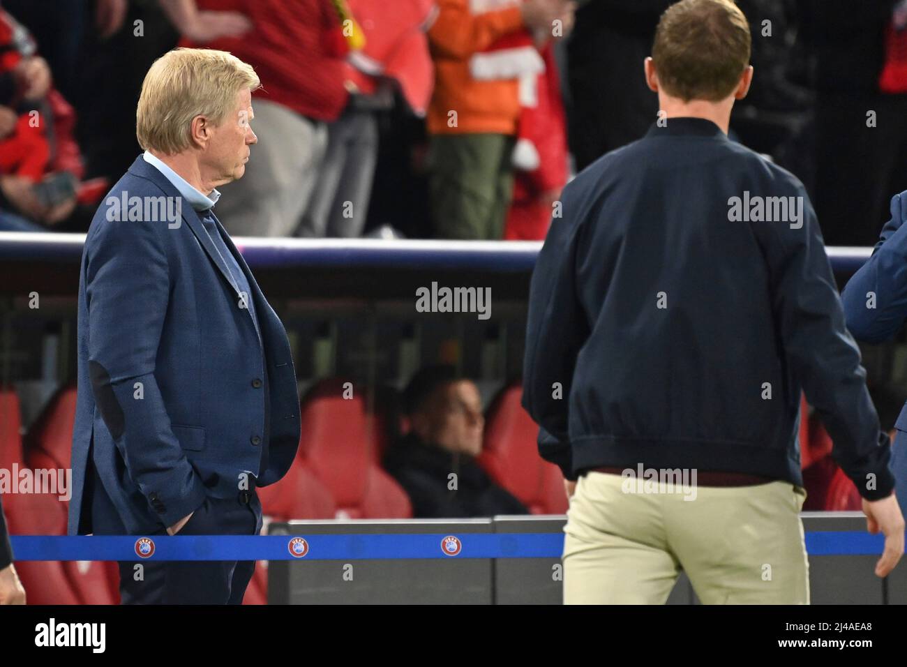 Oliver KAHN (Management Chairman FCB), looks to the side as coach Julian NAGELSMANN (FC Bayern Munich) walks past him, ignores him. Soccer Champions League/ quarter-finals FC Bayern Munich - Villarreal CF 1-1, on April 12th, 2022 ALLIANZARENA . Stock Photo