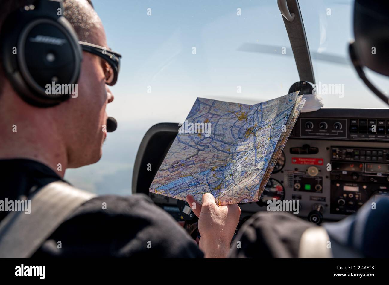 pilot reads map Stock Photo Alamy