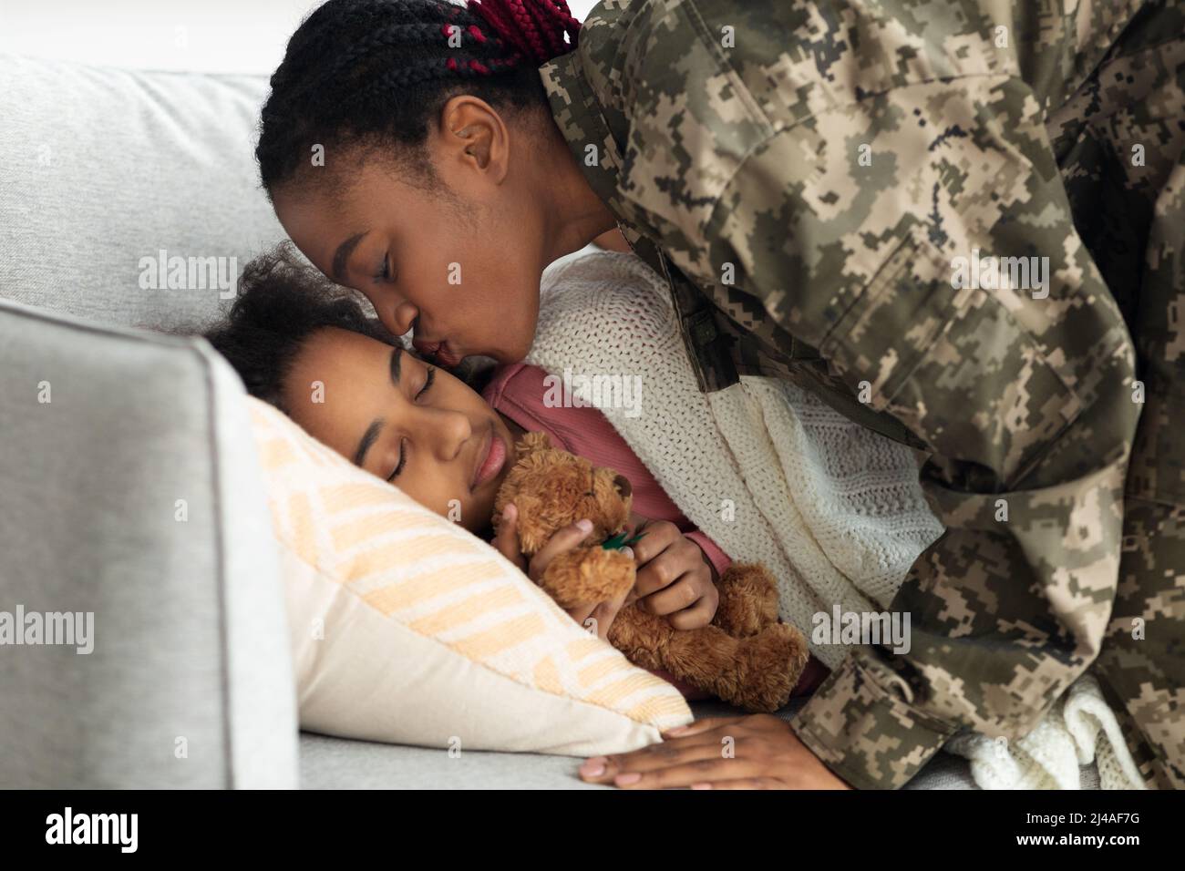 Black Woman Soldier Leaving For Military Service Kissing Sleeping