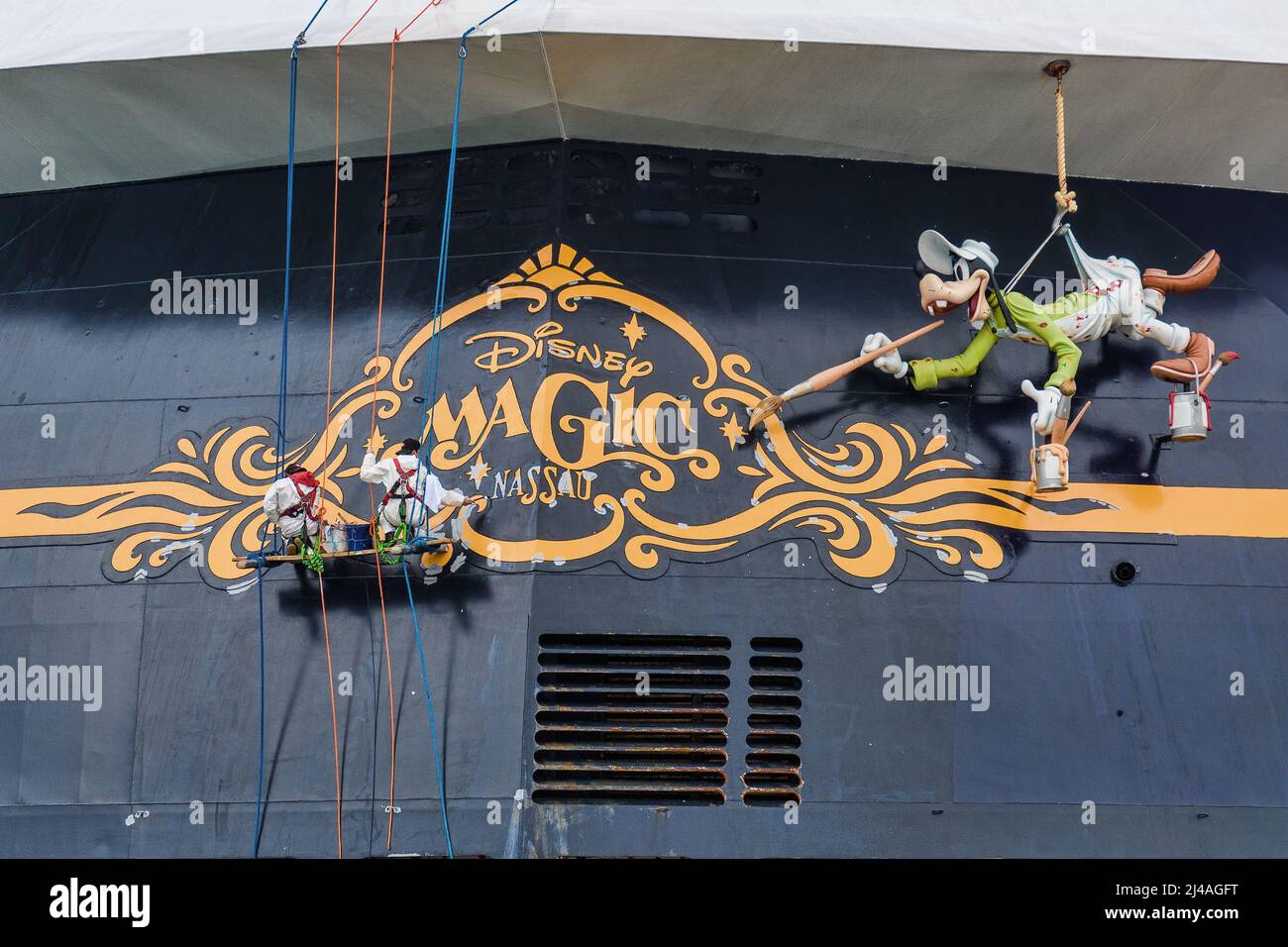 Ship's crew doing maintenance on the cruise ship Disney Magic - May 2021. Stock Photo