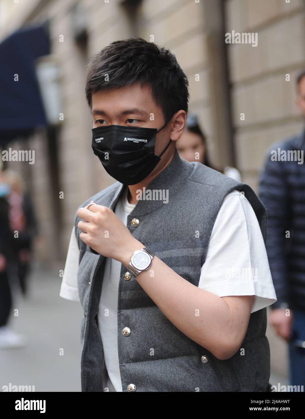 Milan, . 13th Apr, 2022. Milan, 13-04-2022 Steven Zhang, 30 years old, Chinese entrepreneur and President of INTER and SUNING INTERNATIONAL, after having parked his car that he usually uses in the city to go to work, walks towards the offices, trying to walk among the people in order not to be noticed and photographed. Credit: Independent Photo Agency/Alamy Live News Stock Photo