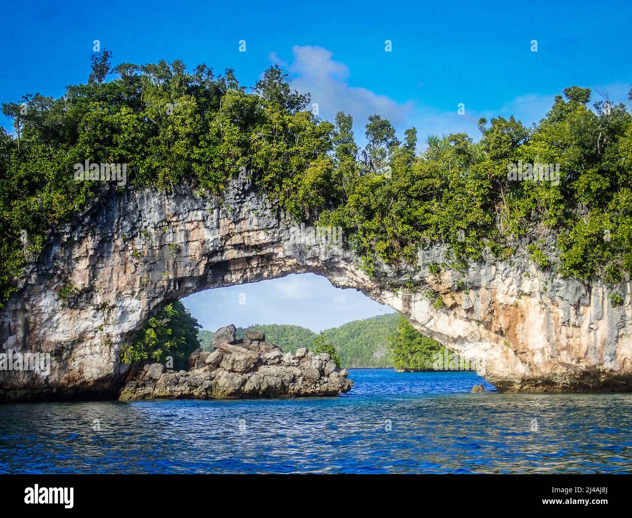 Natural rock arch, Rock Islands, Palau Stock Photo