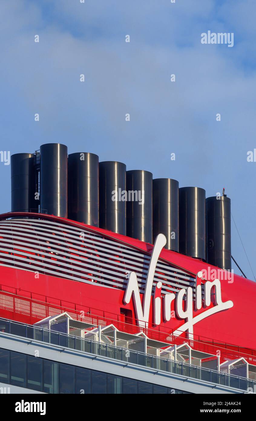 View of the Virgin brand logo on the funnel of the Virgin Voyages' cruise ship Scarlet Lady - June 2021. Stock Photo