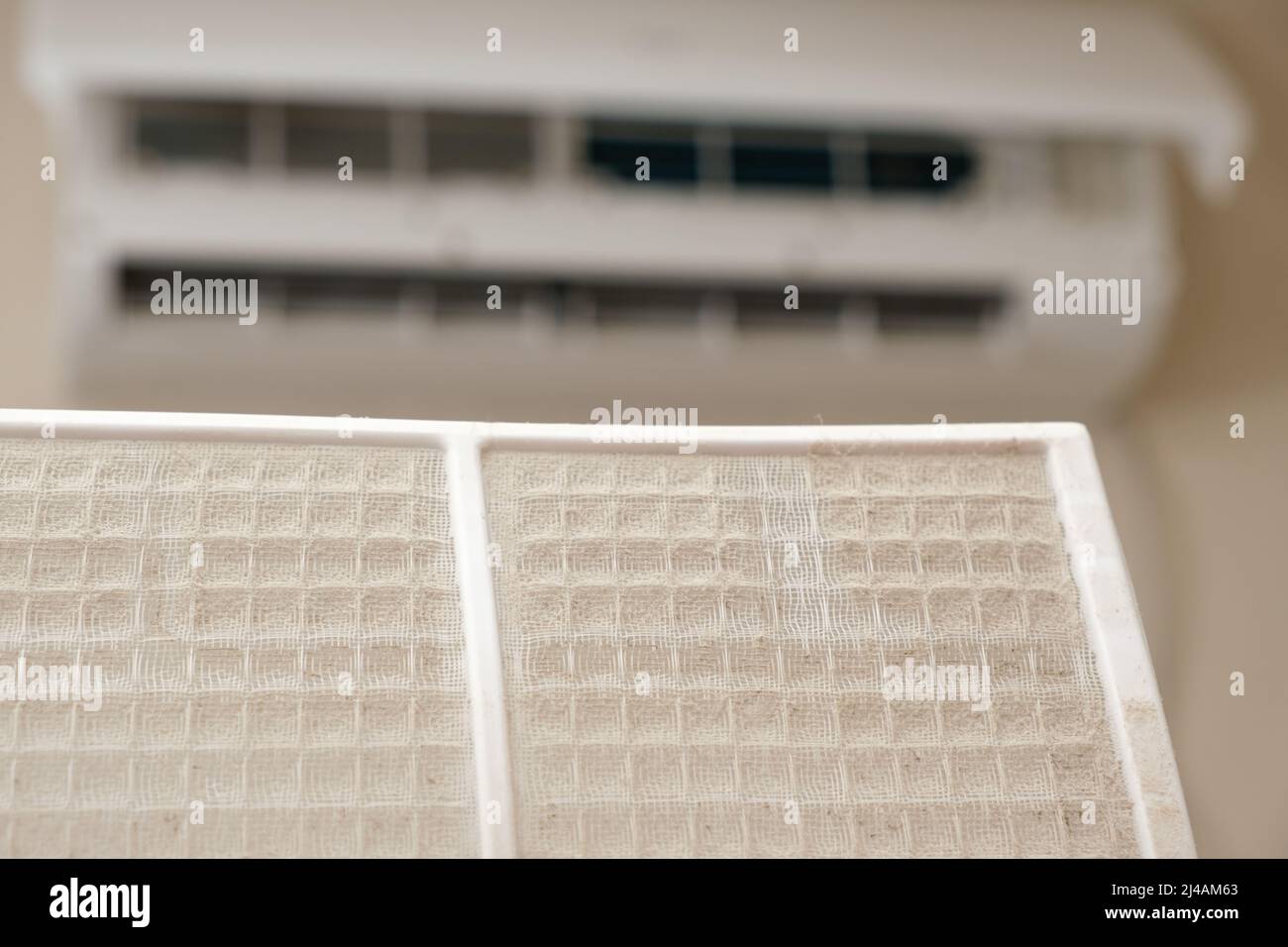 Dusty air conditioner filter. A lot of dust on the net, asthma and