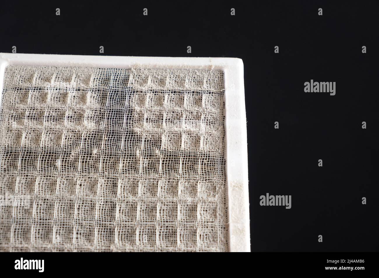Dusty air conditioner filter. A lot of dust on the net, asthma and