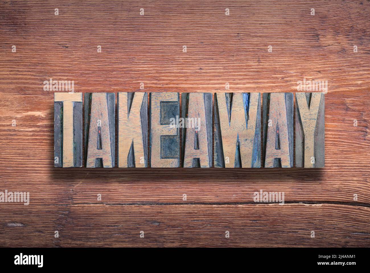 takeaway word combined on vintage varnished wooden surface Stock Photo