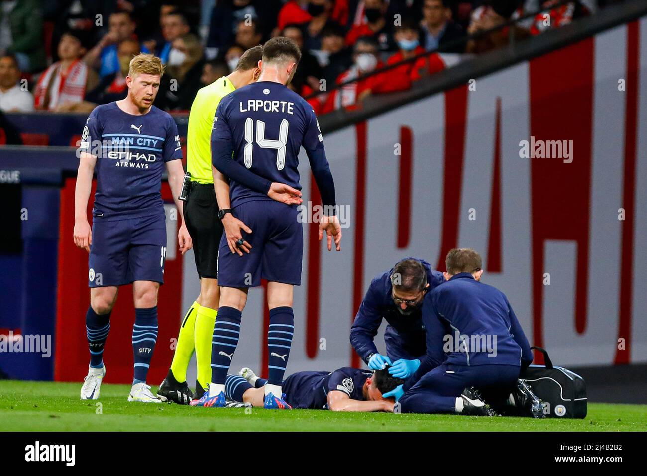 MADRID, SPAIN - APRIL 13: Phil Foden of Manchester City injured on the ground during the UEFA Champions League Quarter-Finals, Second Leg match between Atlético Madrid and Manchester City at Wanda Metropolitano on April 13, 2022 in Madrid, Spain (Photo by DAX Images/Orange Pictures) Credit: Orange Pics BV/Alamy Live News Stock Photo