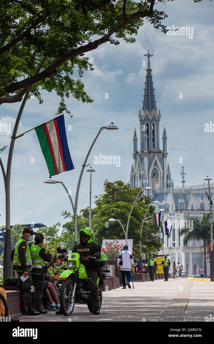 CALI, COLOMBIA - AUGUST 2021. Group of police officers at the Bulevar del Rio on a beautiful sunny day in Cali Stock Photo