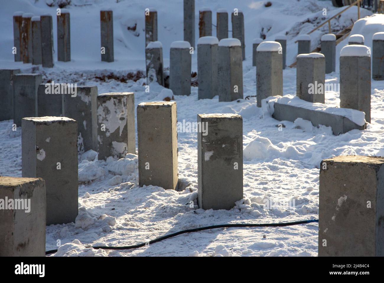 Foundation of a building under construction. concrete columns. Concrete base. Concrete and steel