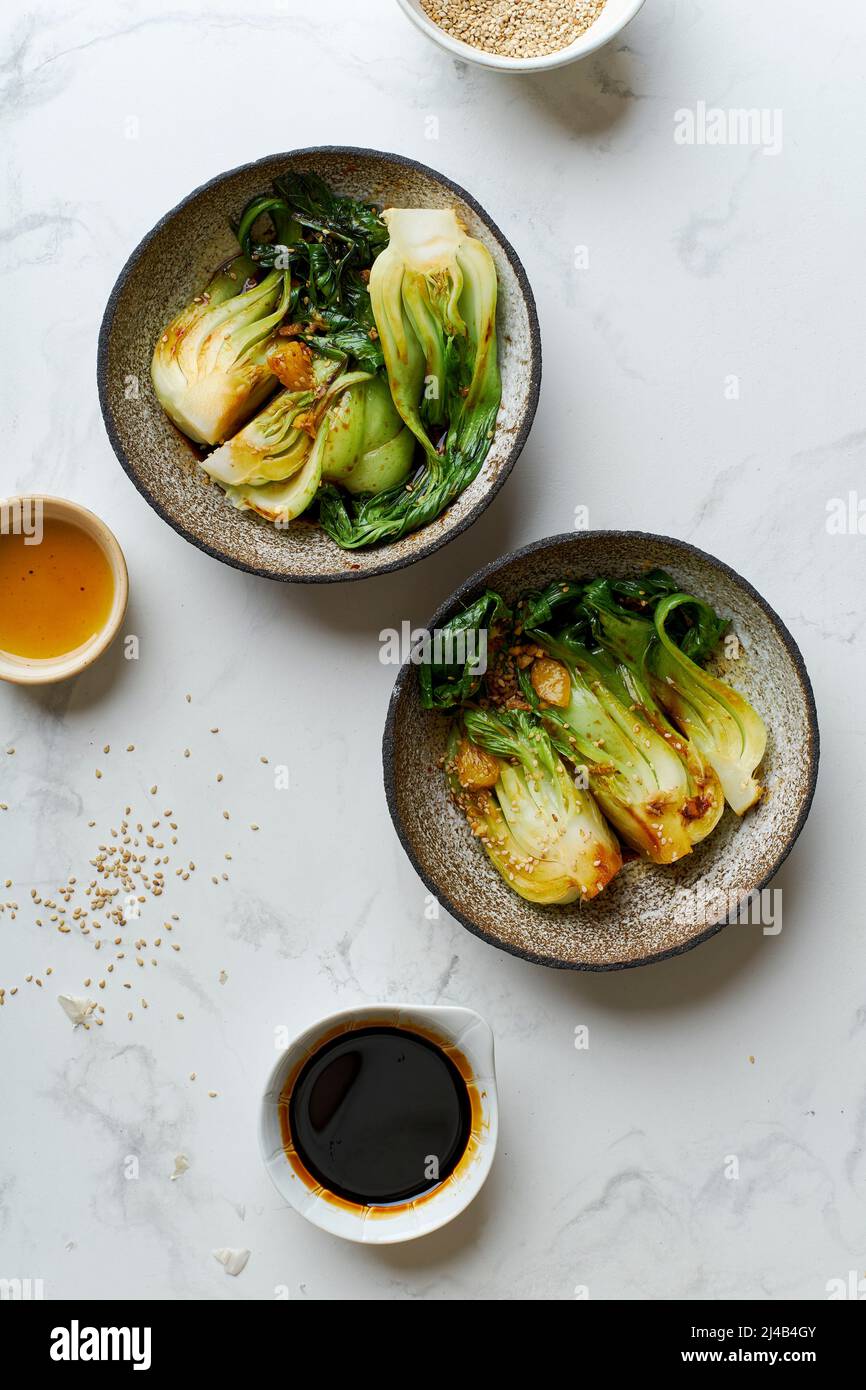 Braised bok choy cabbage with ginger, soy sauce and red orange juice