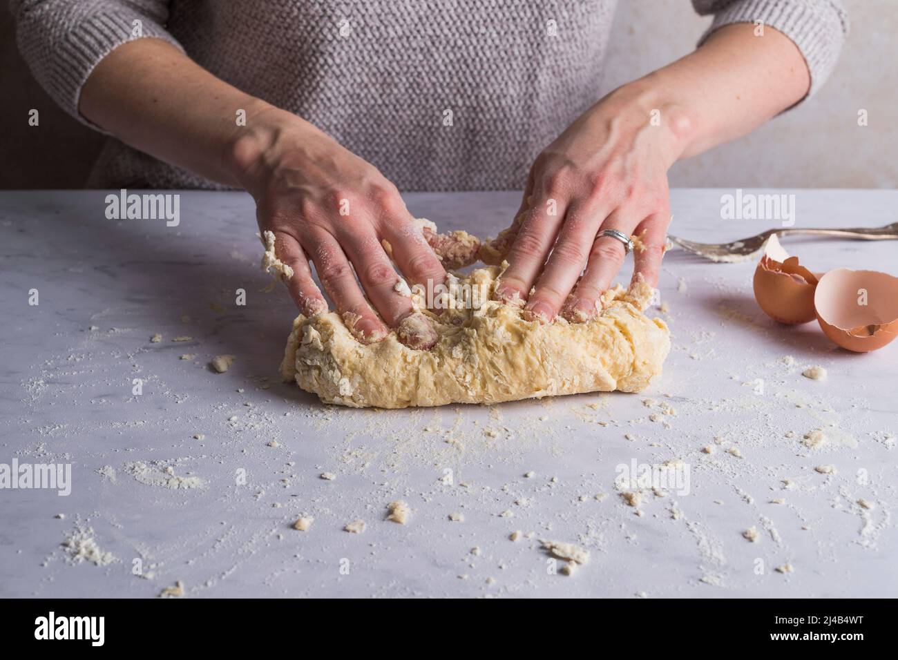 Kneading pasta dough Stock Photo