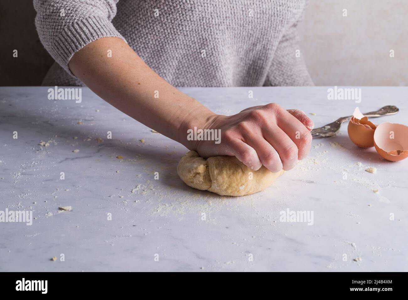 Kneading pasta dough Stock Photo