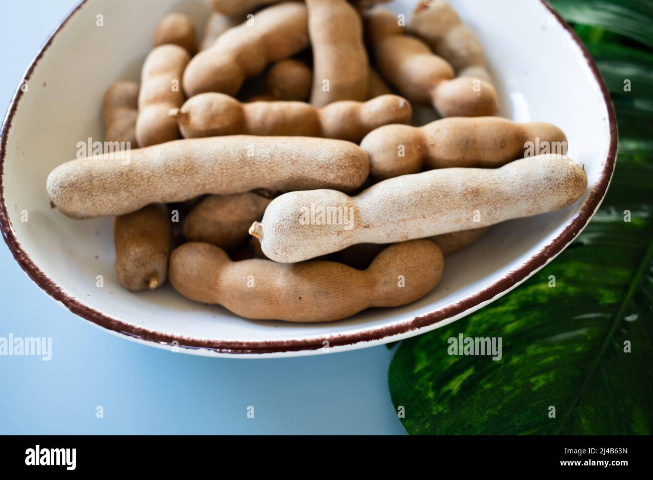 tamarind in a bowl healthy fruit Stock Photo Alamy