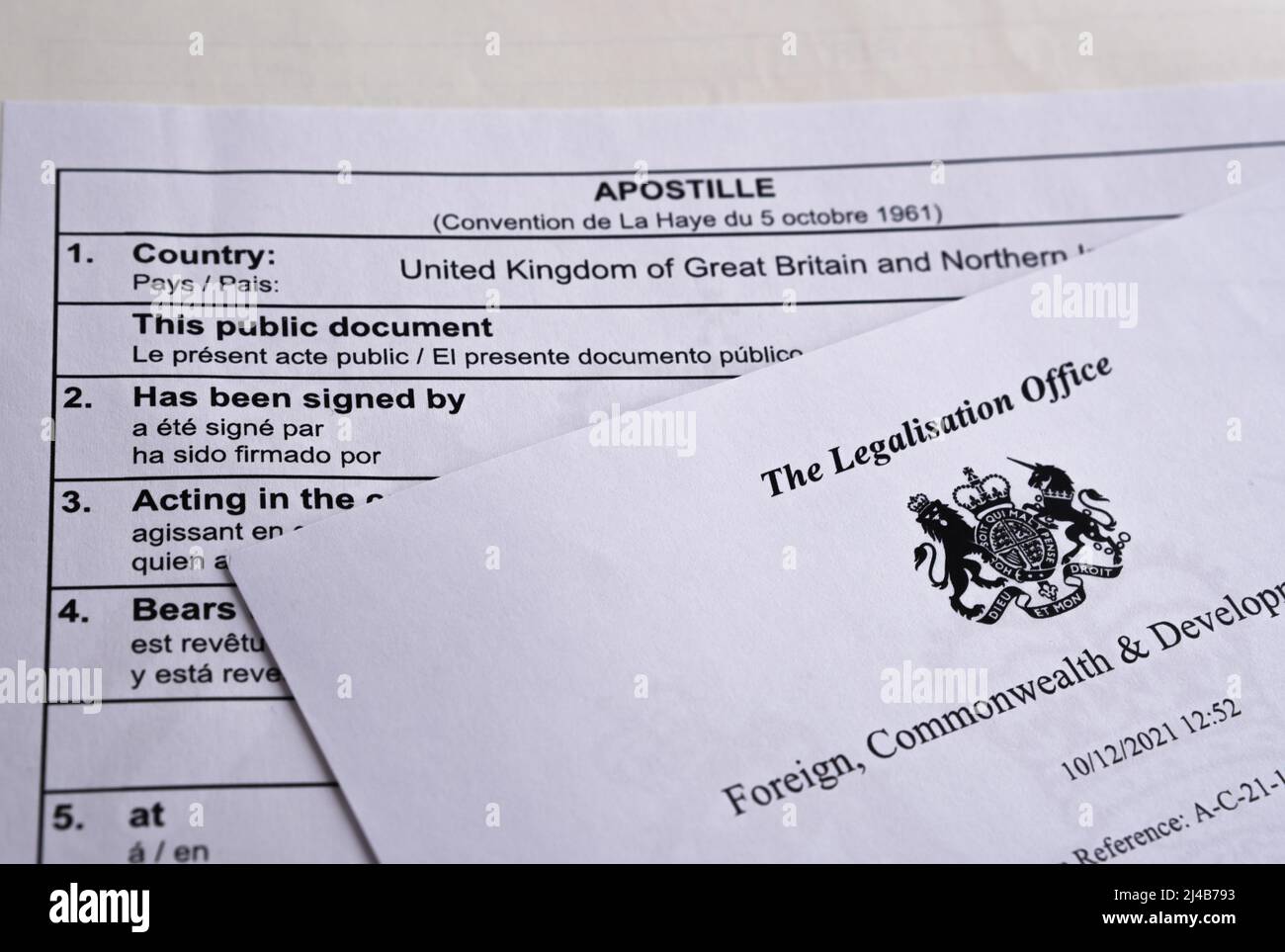 Authentic apostille document from The UK Legalisation Office. Legalised document with the stamped official certificate. Stafford, United Kingdom, Apri Stock Photo