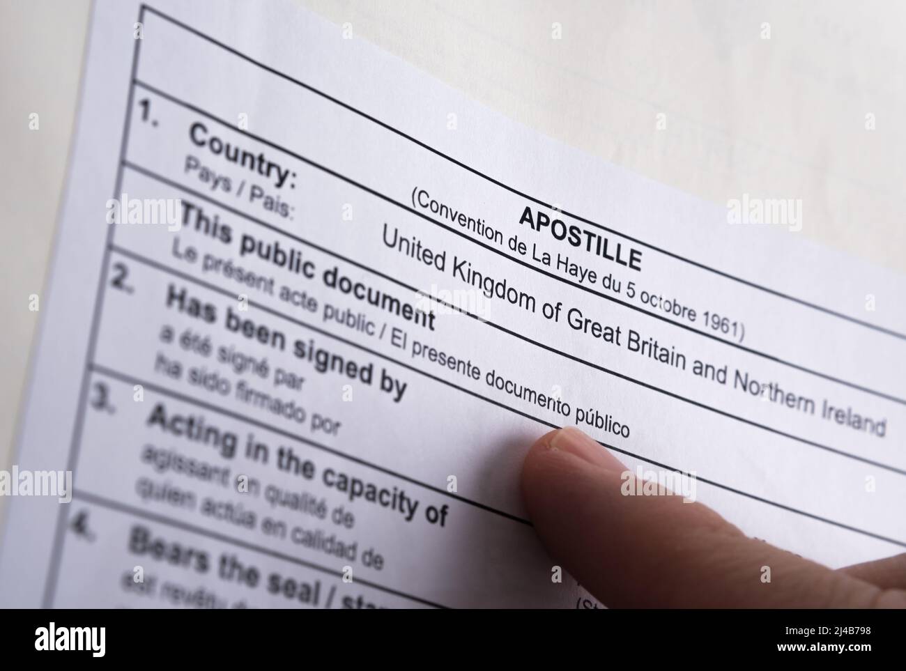 Authentic apostille document from The UK Legalisation Office. Legalised document with the stamped official certificate. Stafford, United Kingdom, Apri Stock Photo