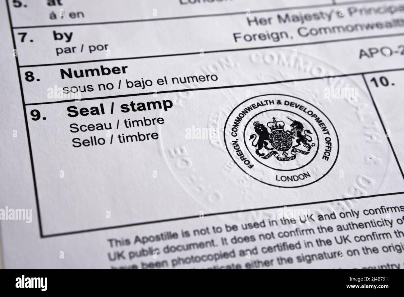 Authentic apostille document from The UK Legalisation Office. Legalised document with the stamped official certificate. Stafford, United Kingdom, Apri Stock Photo