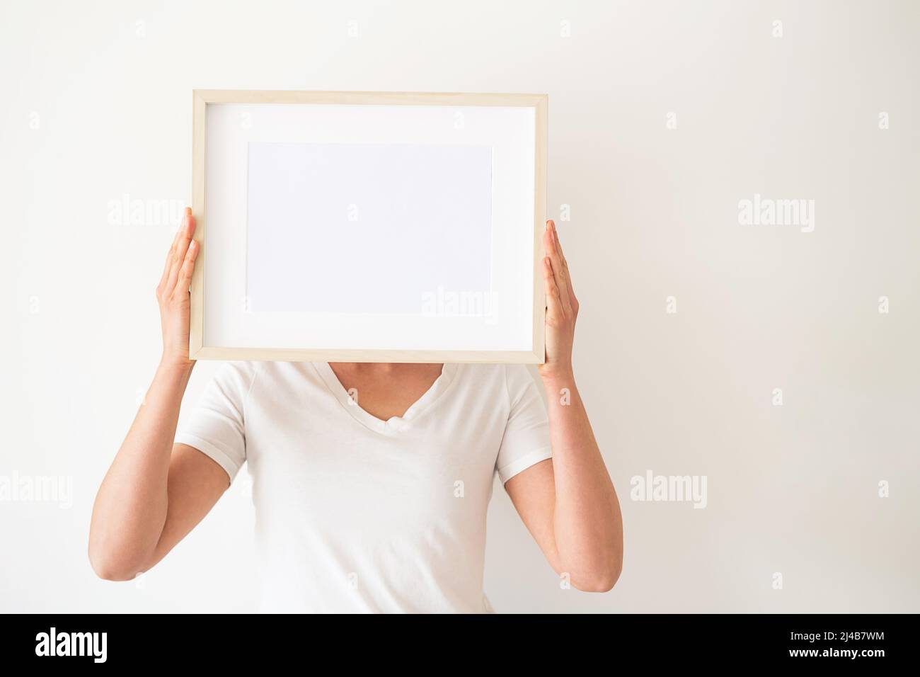 Wooden frames with empty space in the bedroom.  Stock Photo