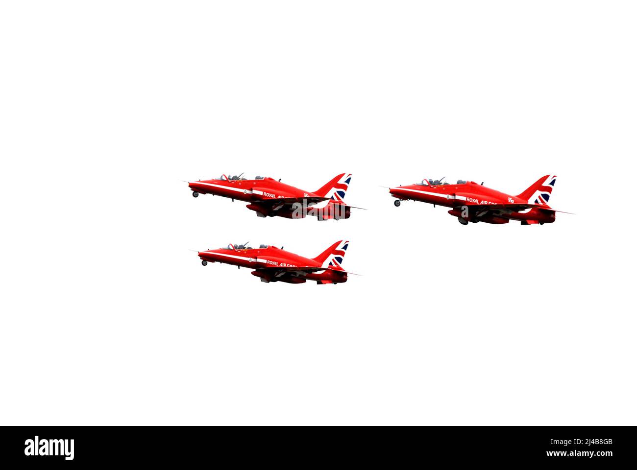 Three Red Arrows Hawk aircraft just after take-off with undercarriage still retracting, at Biggin Hill airshow Stock Photo