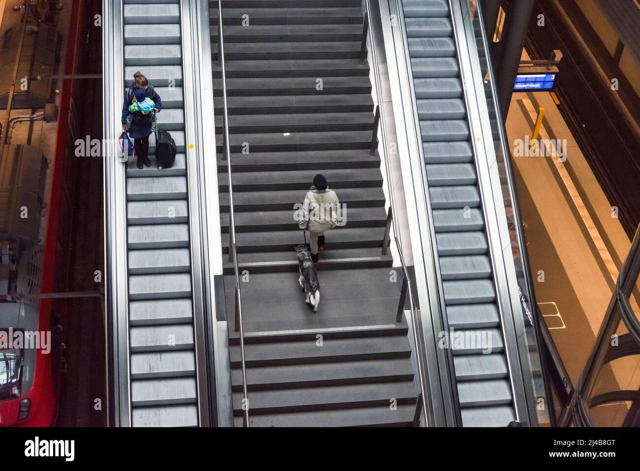 Berlin, Germany - April 2, 2015: Tourists and workers are shopping and traveling at the central station of Berlin on April 2, 2015 in the central stat Stock Photo