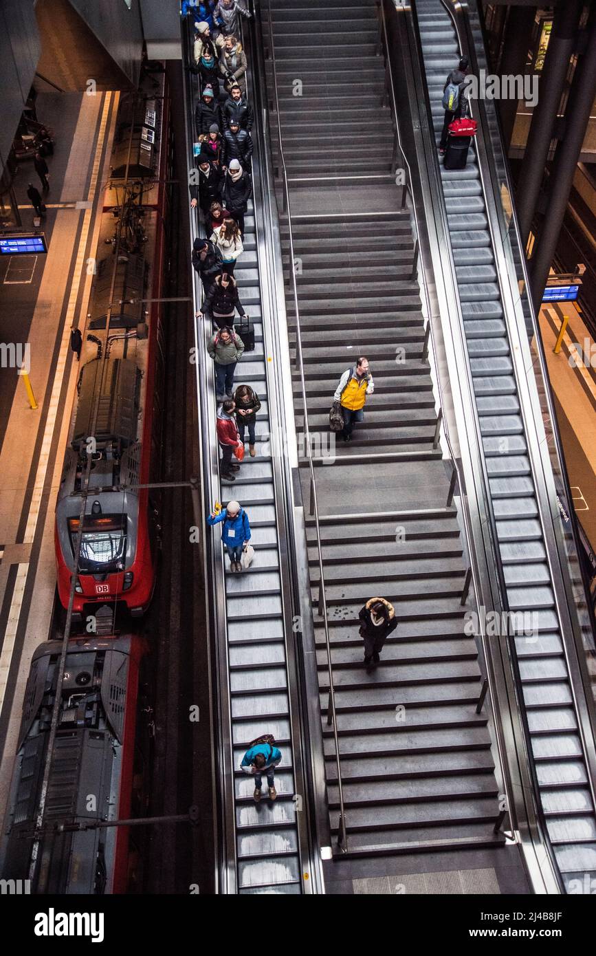 Berlin, Germany - April 2, 2015: Tourists and workers are shopping and traveling at the central station of Berlin on April 2, 2015 in the central stat Stock Photo