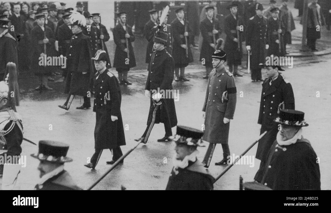 King George's Last Journey Through London. King Edward and his brothers (L to R) The Duke of Gloucester, the Duke of York and the Duke of Kent, following behind the coffin. King George V. passed through London today for the last time - through streets crowded as they have never been crowded before by a vast, silent multitude. Six kings and a President of France walked behind the coffiin on its way from Westminster Hall to Paddington Station, from where it was taken by train to Windsor, for the final interment. January 28, 1936. (Photo by Keystone). Stock Photo