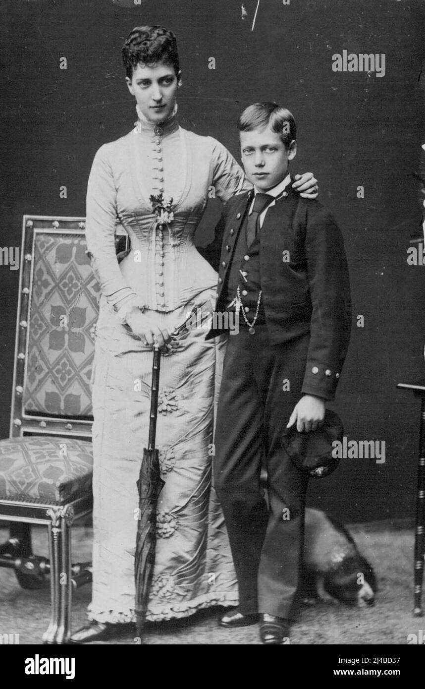 King George as a boy with his mother Queen Alexandra. May 3, 1935. (Photo by W. & D. Downey). Stock Photo