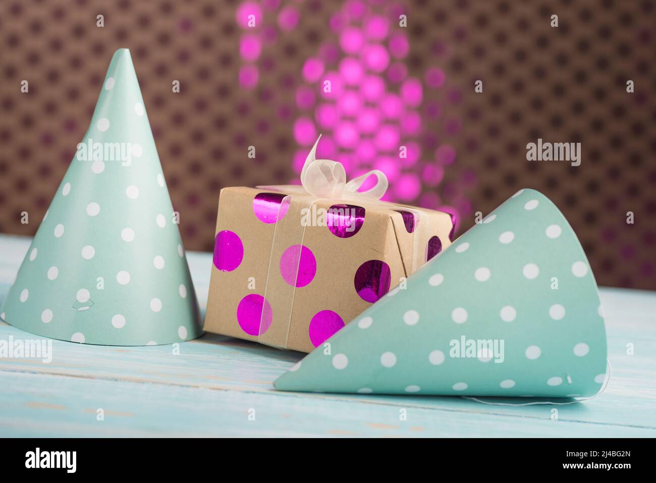 Two caps and a gift Stock Photo Alamy