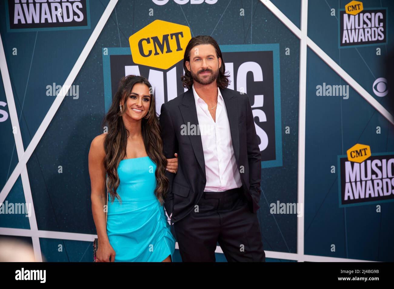 Nashville, Tenn. - April 11, 2022 Sophia Sansone and Riley Green arrives at the red carpet for the 2022 CMT Awards on April 11, 2022 at Municipal Auditorium in Nashville, Tenn. Credit: Jamie Gilliam/The Photo Access Stock Photo