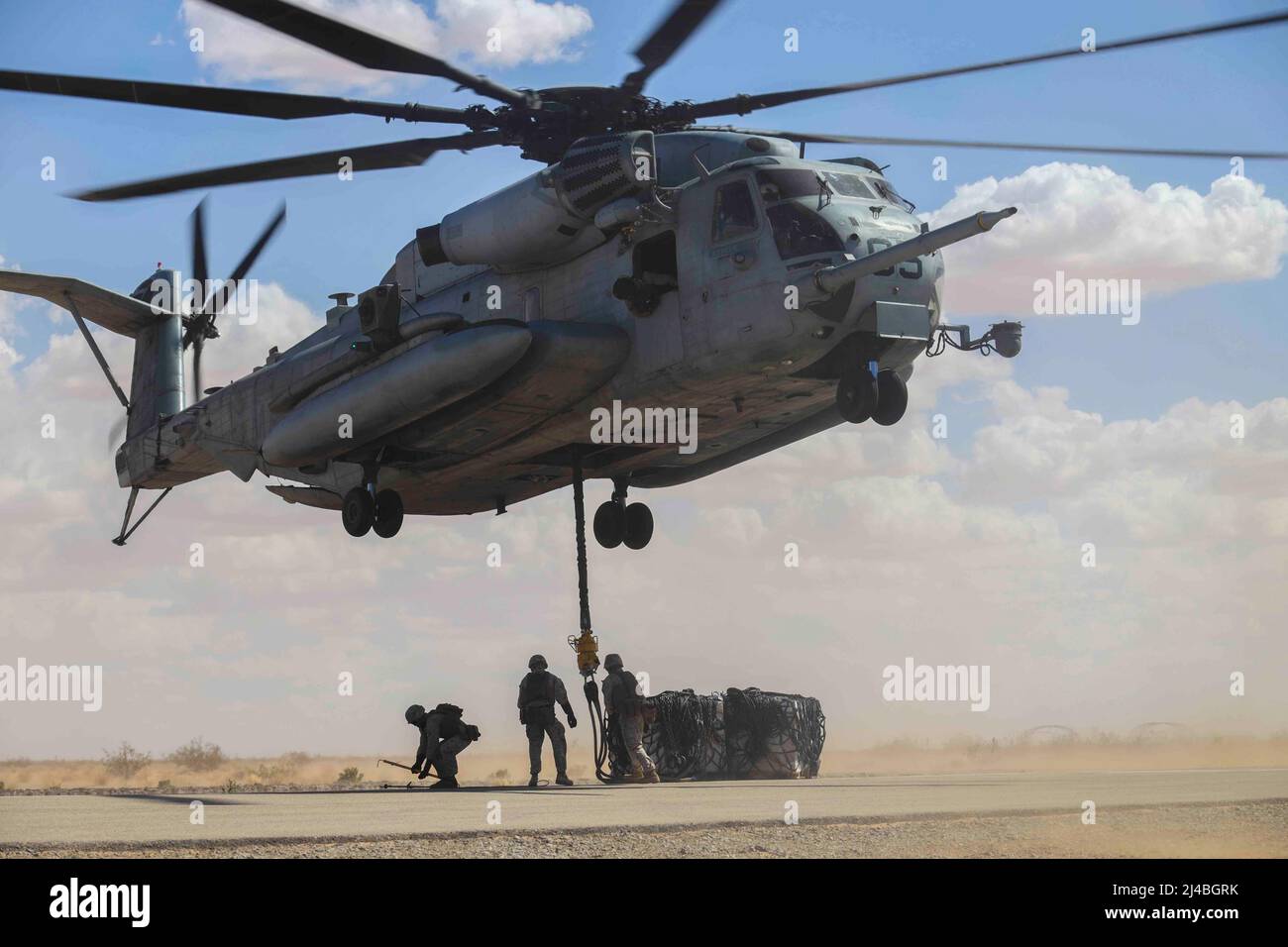 Yuma, Arizona, USA. 29th Mar, 2022. U.S. Marines assigned to Marine Aviation Weapons and Tactics Squadron One (MAWTS-1), conduct an external lift exercise during Weapons and Tactics Instructor (WTI) course 2-22, at Auxiliary Airfield II, near Yuma, Arizona, March 29, 2022. WTI is a seven-week training event hosted by MAWTS-1, providing standardized advanced tactical training and certification of unit instructor qualifications to support Marine aviation training and readiness, and assists in developing and employing aviation weapons and tactics. (Credit Image: © U.S. Marines/ZUMA Press Wire S Stock Photo