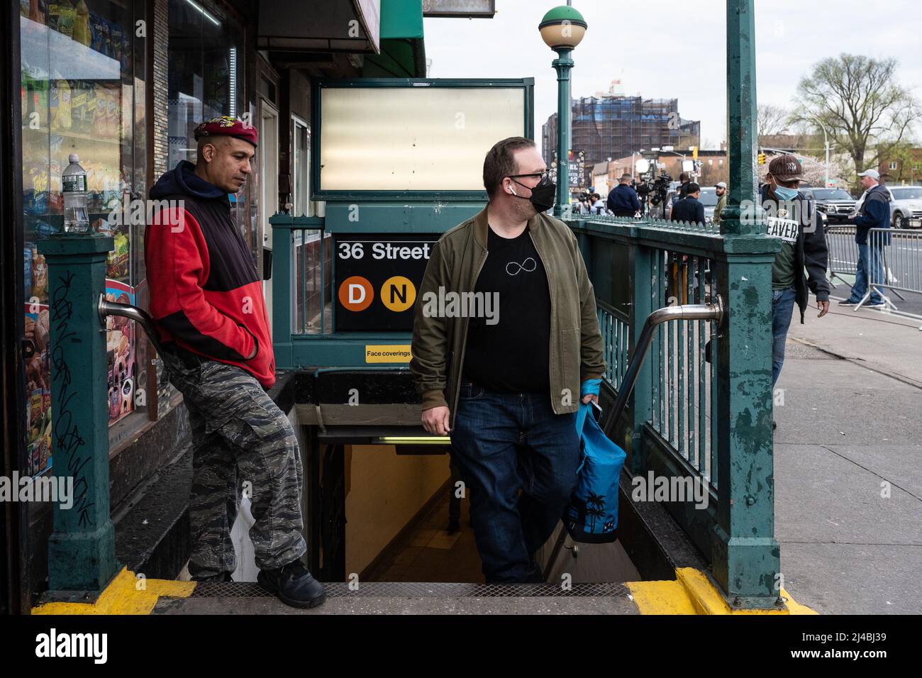 New York, USA. 13th Apr, 2022. A member of the Guardian Angels is on patrol outside the 36th Street subway station in Brooklyn, New York, on Apr. 13, 2022. (Photo by Gabriele Holtermann/Sipa USA) Credit: Sipa USA/Alamy Live News Stock Photo