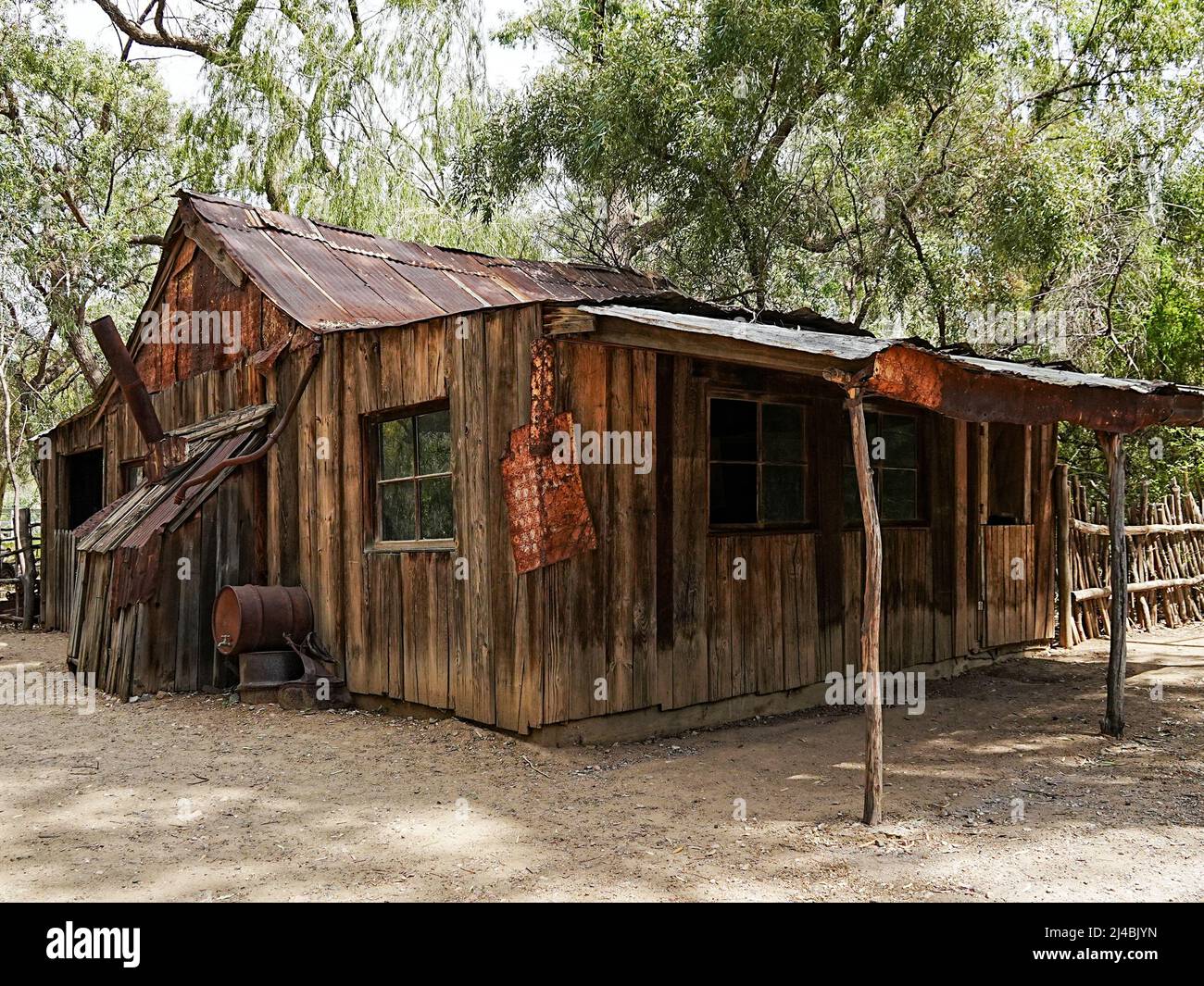 A recreation of a sheep shearing operation in the outback is shown at a desert botanical park Stock Photo