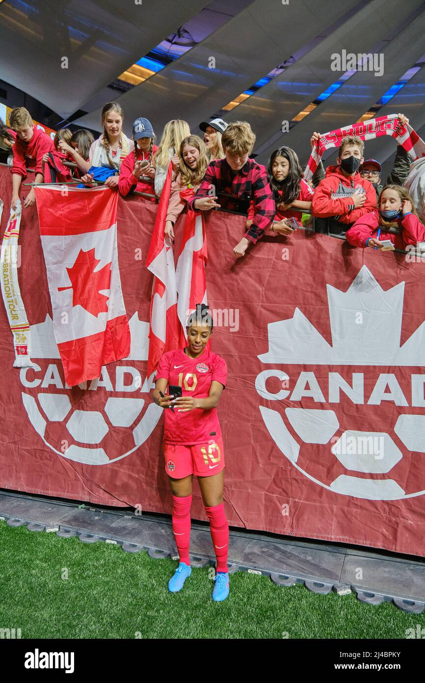 Vancouver, British Columbia, Canada. 8th April, 2022. Ashley Lawrence of Team Canada taking selfie with fans after the first Canada Soccer’s Women’s N Stock Photo