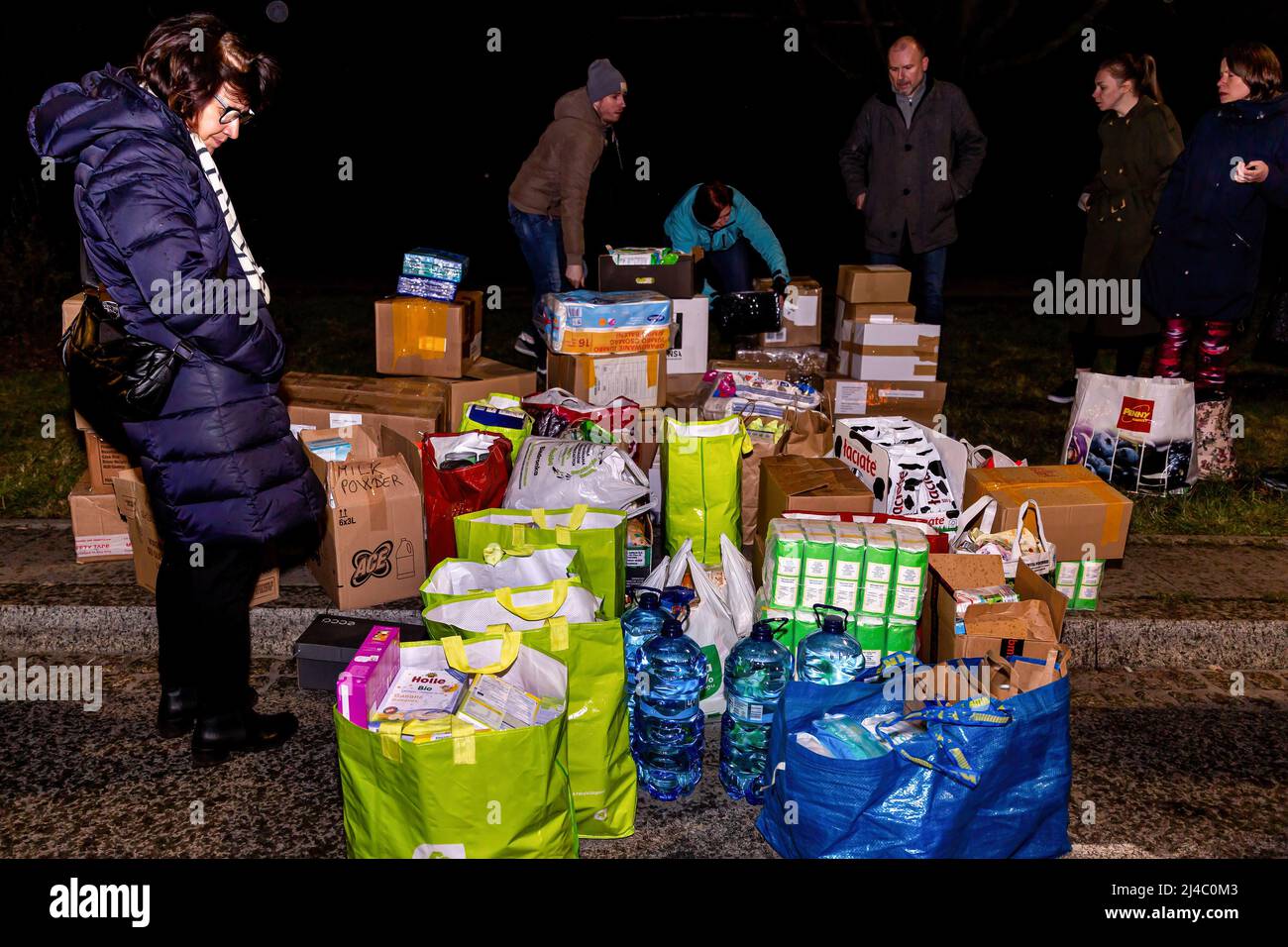 Volunteers collect parcels to be delivered to Lviv by volunteering business - Abdar Travel Agency as part of their humanitarian effort for war-stricken Ukraine. As the Russian Federation invaded Ukraine, the conflict is expected to force up to 5 million Ukrainians to flee the country and create a large number of internal refugees. Ukrainians are in dire need of medical supplies, food, clothes, and more. Stock Photo