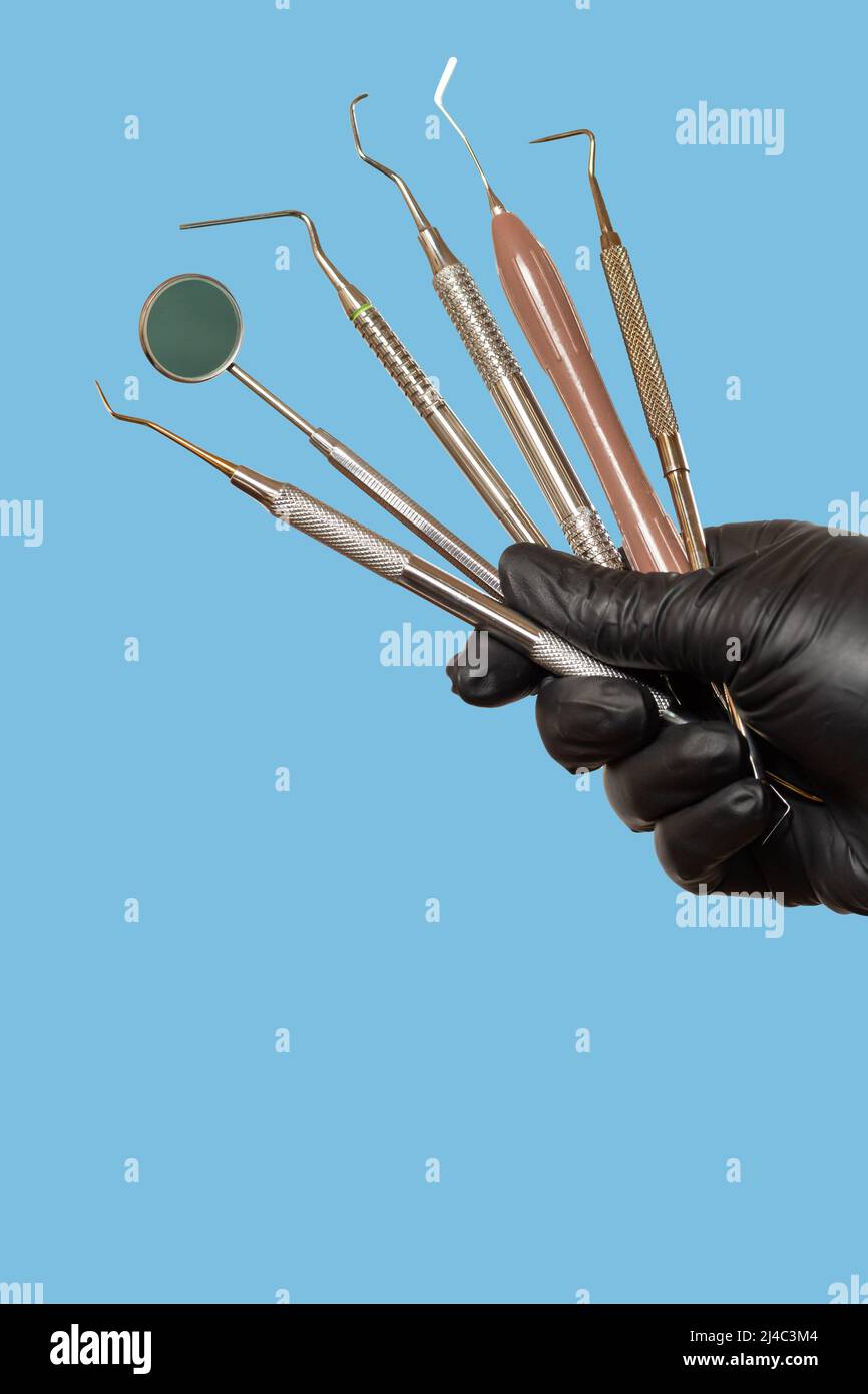 Set of composite filling instruments for dental treatment. Dental mouth