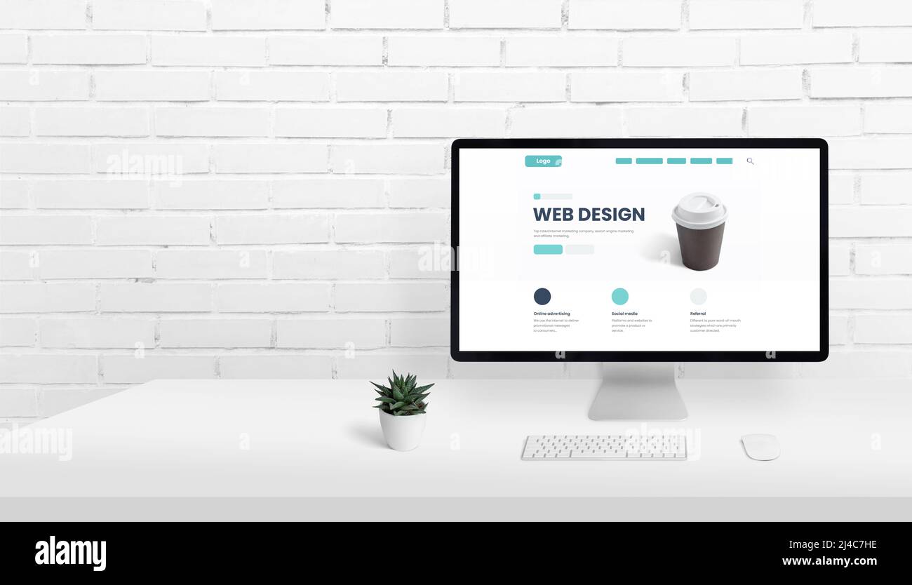 Web design homepage concept on computer display with copy space beside Stock Photo