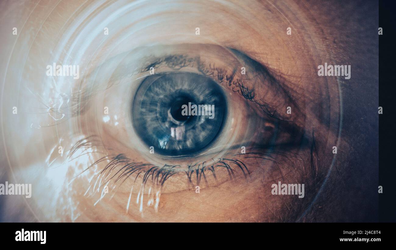 Close up of a Blue Human Eye with a 3d Overlay effect Stock Photo