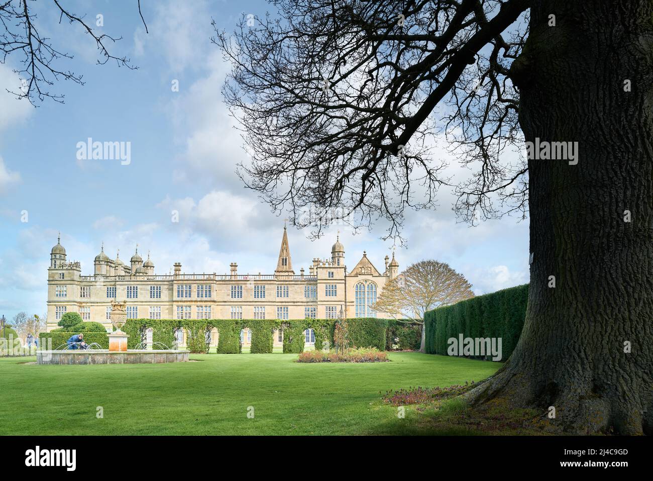 Spring day in the South garden at Burghley House, Stamford, England, an elizabethan mansion owned by the Cecil family. Stock Photo