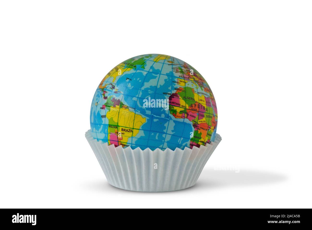 World planet in paper cupcake cup - Earth day concept Stock Photo