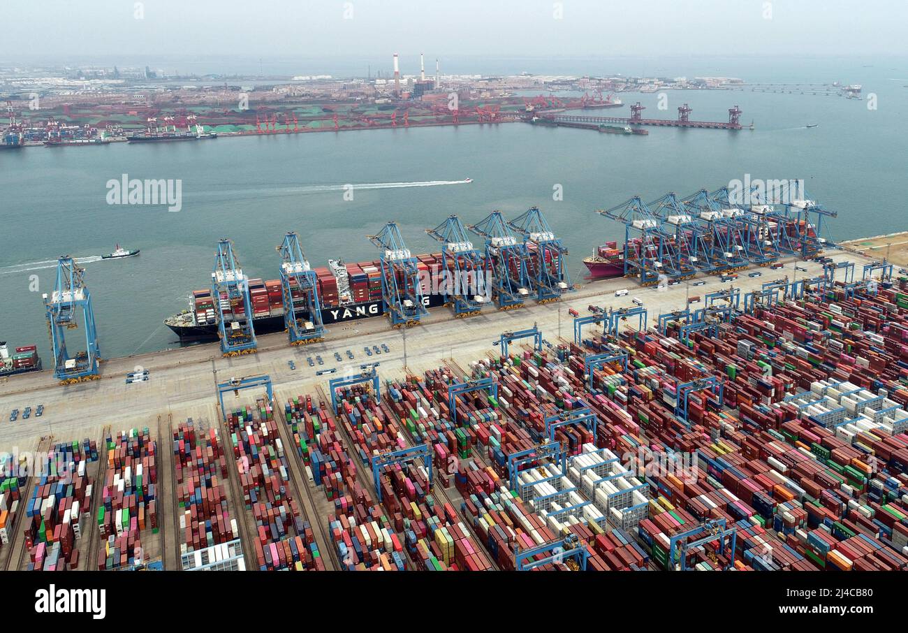 QINGDAO, CHINA APRIL 13, 2022 Cargo ships dock at Qingdao Port in Qingdao, East China's