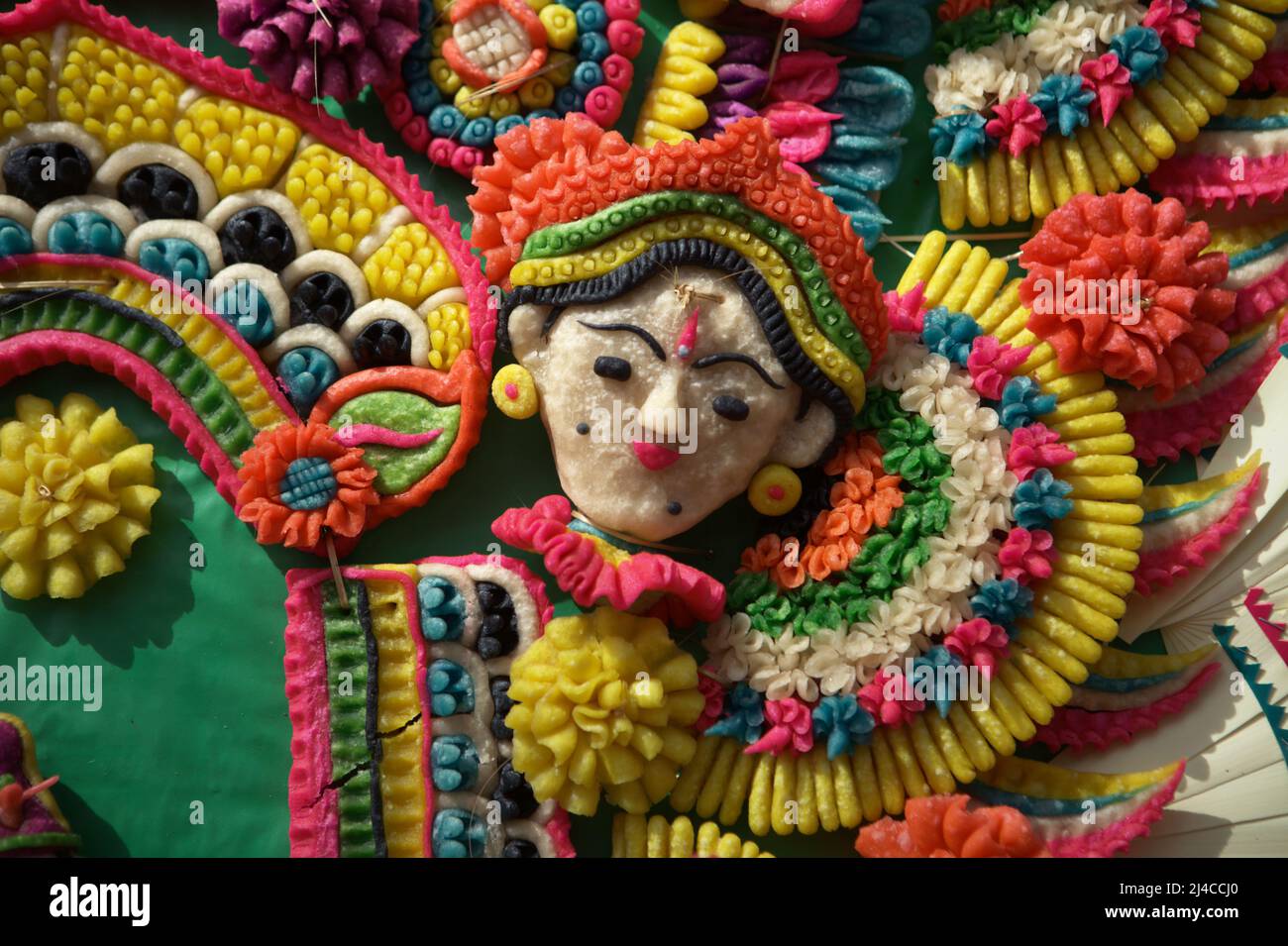 Traditional, sculptural art made of rice flour as an offering for spiritual ceremony in Bedugul, Tabanan, Bali, Indonesia. Stock Photo
