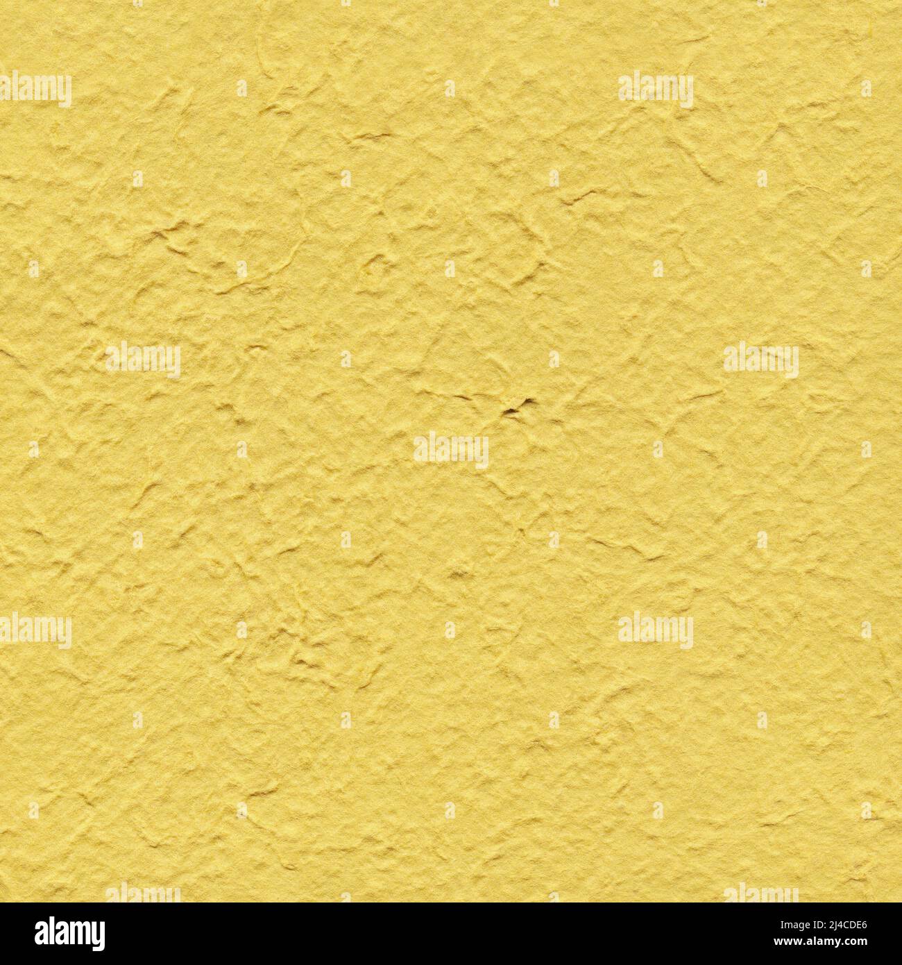 Yellow handmade paper background with pattern Stock Photo