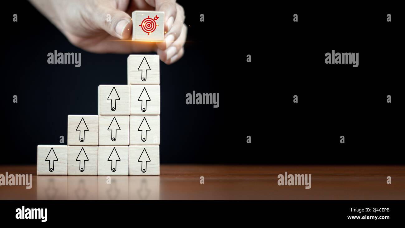 hand stack woods block step on table with icon Action plan, Goal and ...