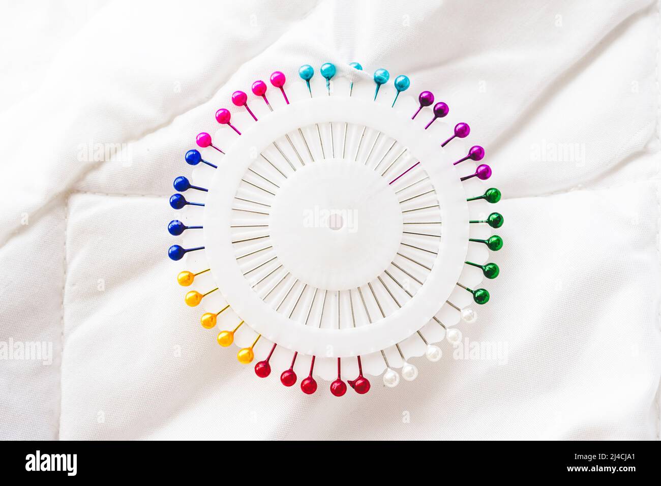 close up of a Rainbow and colorful circle made by pins Stock Photo