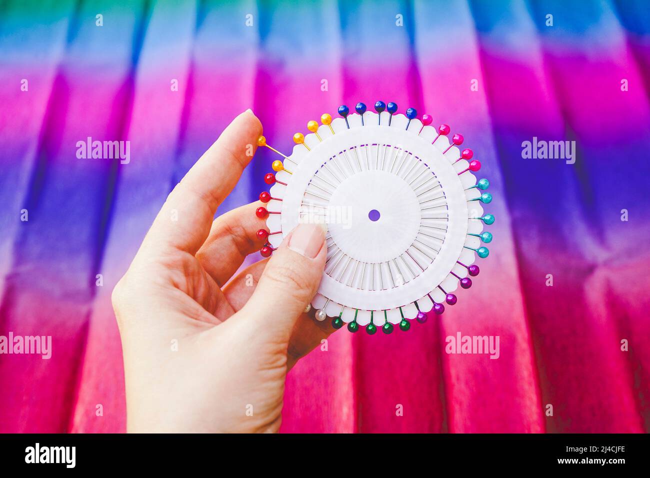 close up of a Rainbow and colorful circle made by pins Stock Photo